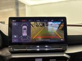 a picture of a car ' s dashboard with a camera mounted on it