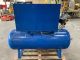 a blue air compressor sitting on top of a wooden pallet