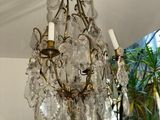 a chandelier hanging from the ceiling in a room