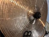 a close up view of a drum set with cymbals