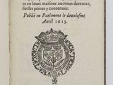 un livre ouvert sur lequel figure un blason