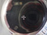 a close up of a glass of wine on a table