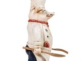 a figurine of a chef holding a spatula