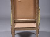 a cardboard chair that is sitting on the floor