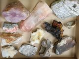 a box full of different types of rocks and stones