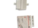 two white electrical plugs that are connected to each other