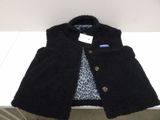 the jacket is black and has a leopard print shirt underneath it