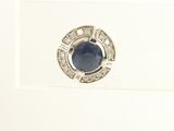 an image of a blue sapphire and diamond ring