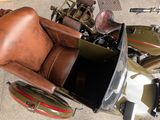 a motorcycle with a side car attached to the back of it