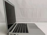 a laptop computer that is sitting on a table