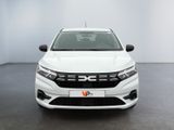 the front of a white honda cr - v parked in a white room
