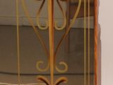 a mirror that has a design on it in a room