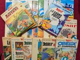beaucoup de bandes dessinées posées sur une table rouge