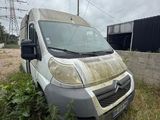 an image of a van that is sitting in the grass