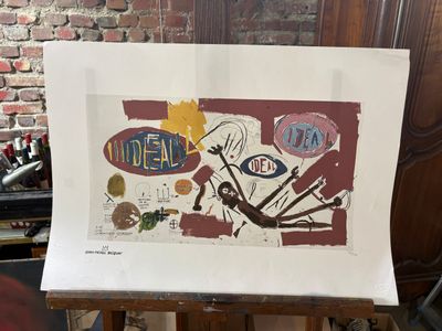 a picture of a painting on a easel with a brick wall in the background