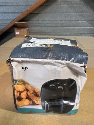 a box of fried chicken sitting on a table