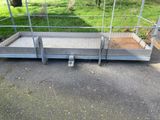 a metal ramp that is on the side of the road