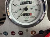 a close up of a speedometer on a motorcycle