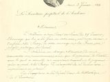 un vieux document sur lequel figure la photo d'un homme portant un turban