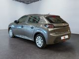 a picture of a silver car in a showroom