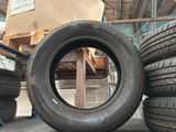 several tires stacked on top of each other in a warehouse