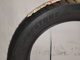 a close up of a tire with a hole in the tire