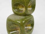 two green ceramic cubes stacked on top of each other