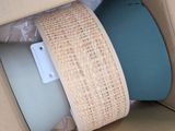 a cardboard box with a computer inside of it