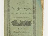 un vieux livre sur lequel figure l'image d'un bateau