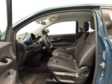 the interior of a car with the door open and the driver ' s seat up