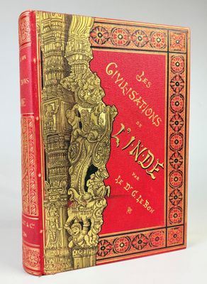 a red and gold book with ornate design on the cover