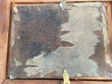 a picture of an old wooden picture frame with paint on it