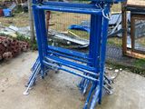 a blue frame that is sitting on the ground