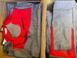 boxes of clothing are packed and ready to be packed into the box