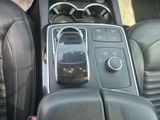 an image of a car dashboard with a cell phone in the center
