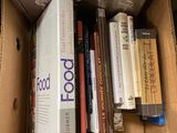 a box full of books sitting on a table