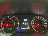 a close up of a car dashboard with various gauges