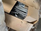 a cardboard box with a bunch of scissors inside of it