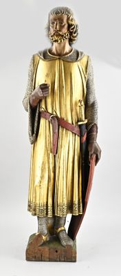 a statue of a man with a sword and a shield