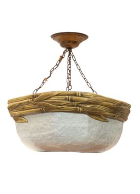 a close up of a light fixture hanging from a ceiling