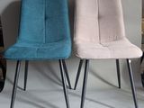 three chairs sitting next to each other in a room