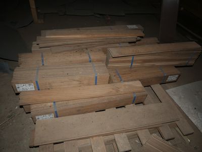 many pieces of wood stacked on top of each other
