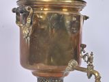 brass plated coffee urn on stand with faucet and spout