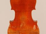 an old violin with a wooden back and a long neck