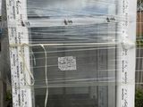 a large window that has been wrapped up in plastic