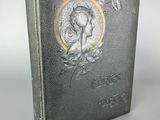 an old book with a picture of a woman on it