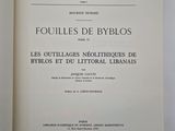 an open book with a black and white title on it
