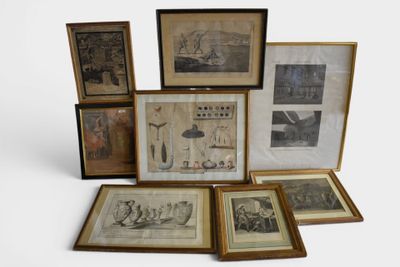 many framed pictures of people and animals on the wall
