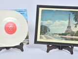 a picture of a picture of the eiffel tower and a picture of a picture of the eiffel tower
