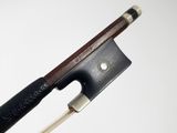 a bow that is attached to a bow on a white background